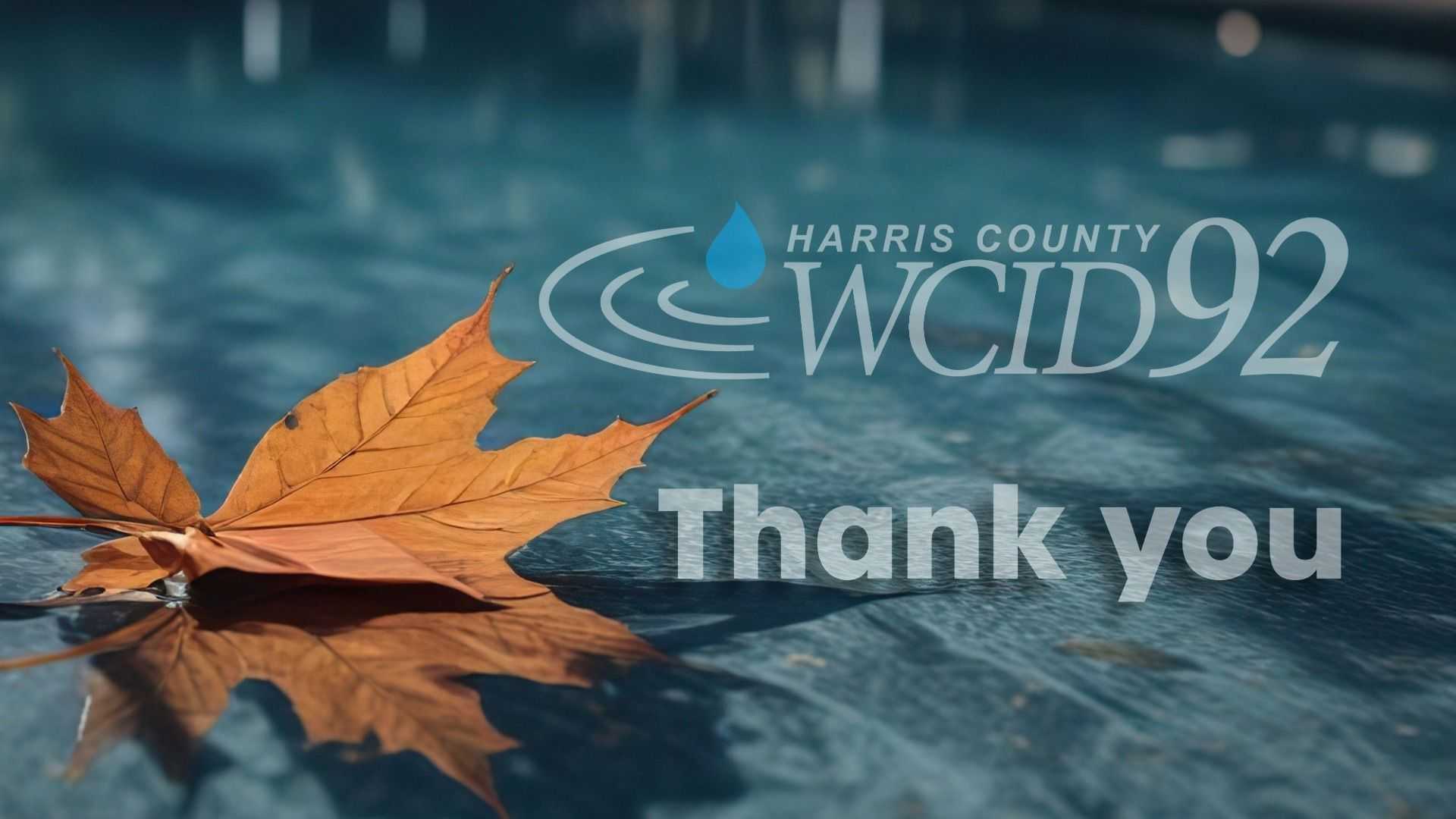 Brown autumn leaves floating on water beside the Harris County WCID 92 logo and the words “Thank you” on a blue water-themed background.